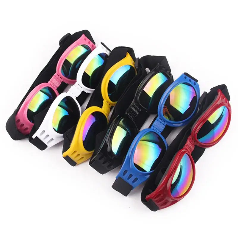 Collection of colorful ski goggles with iridescent lenses.