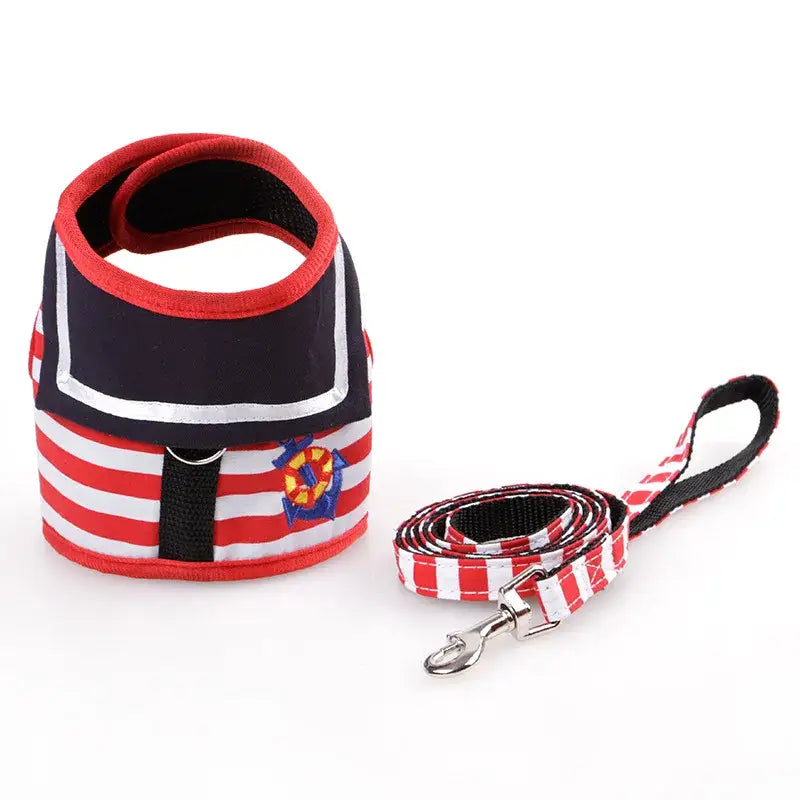 Nautical-themed pet harness with matching leash in red, white, and navy stripes.