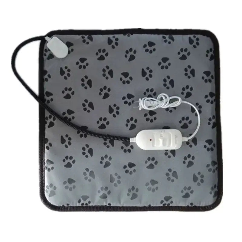 Pet heating pad with paw print pattern and electrical cord.