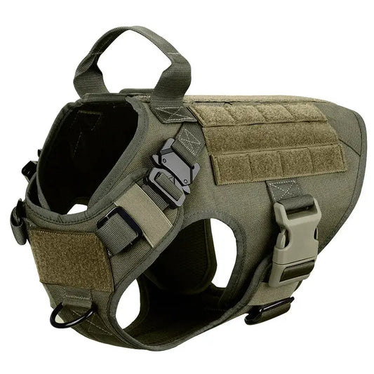 Tactical military-style dog harness in olive green with adjustable straps and MOLLE webbing.