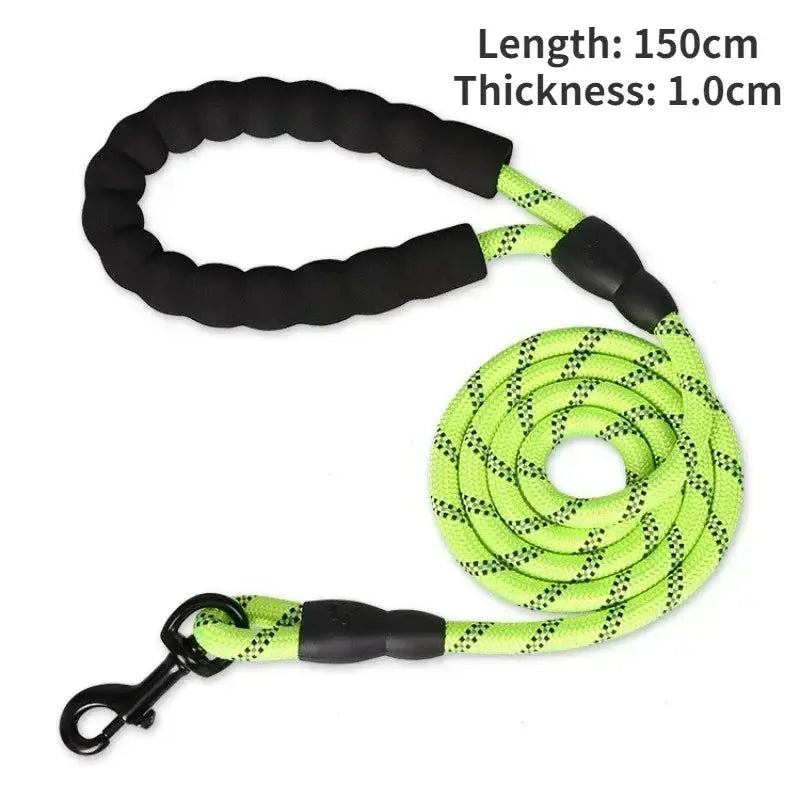 Dog leash with a braided black handle and neon green rope section.