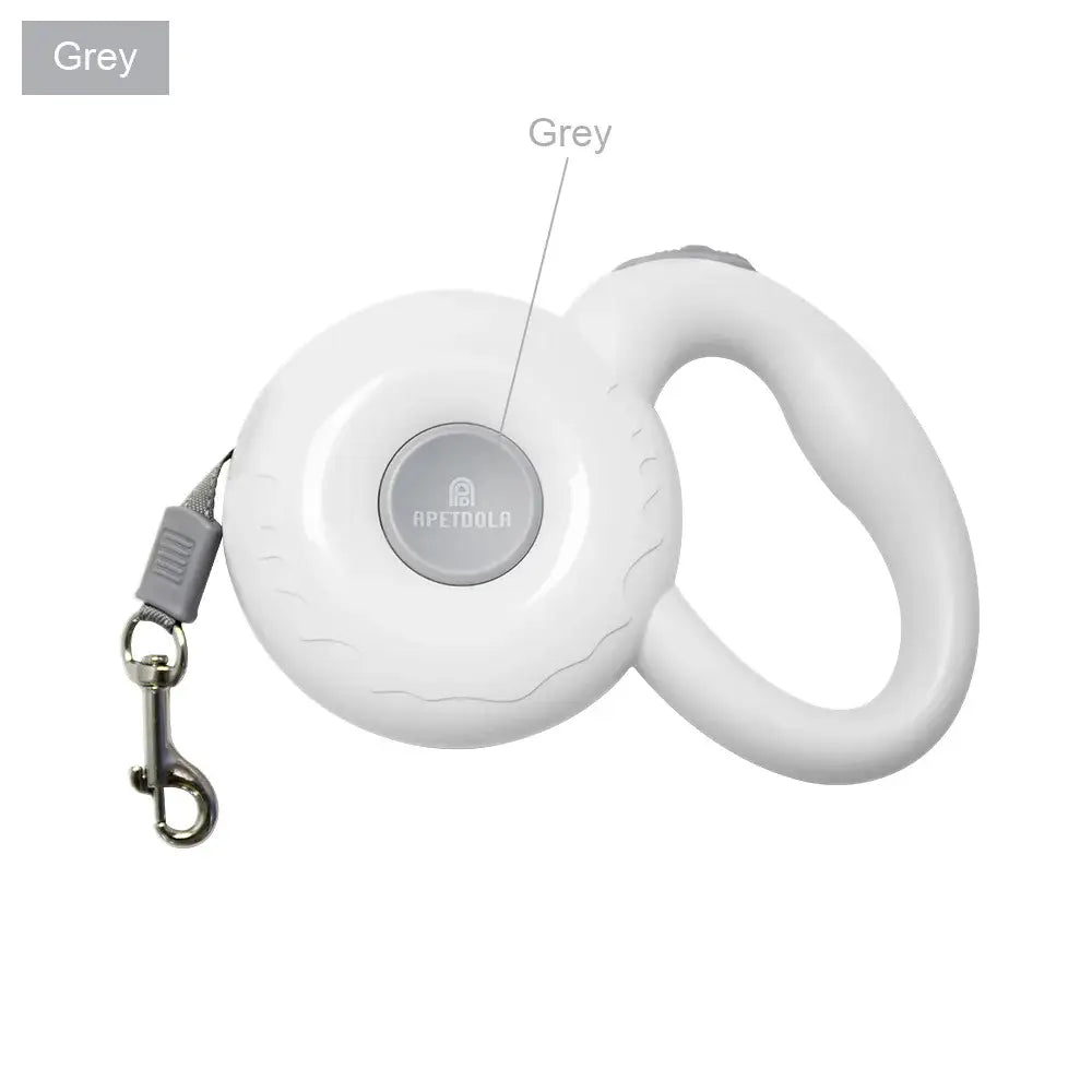 Retractable dog leash with a white casing and grey accents.