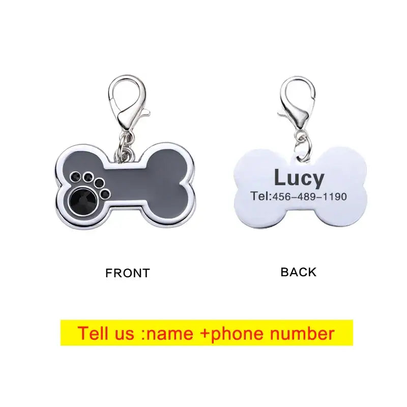 Dog tag with customizable front and back designs for pet identification.