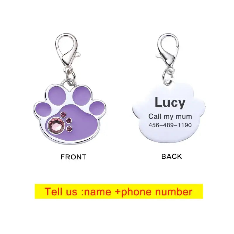 Pet ID tag with a paw print design on the front and personalized information on the back.