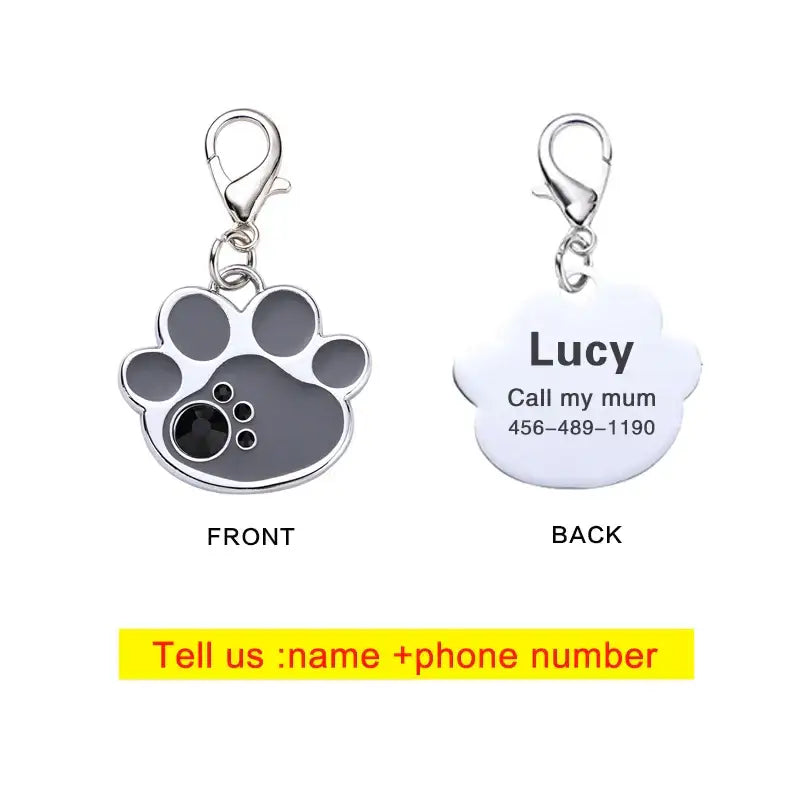 Pet identification tag shaped like a paw print with customizable information on the back.