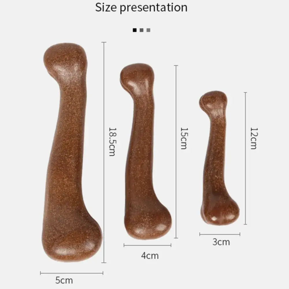 Brown wooden massage tools or gua sha implements in three different sizes.