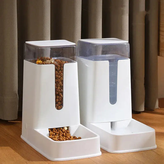 Automatic pet food and water dispensers with transparent storage containers.