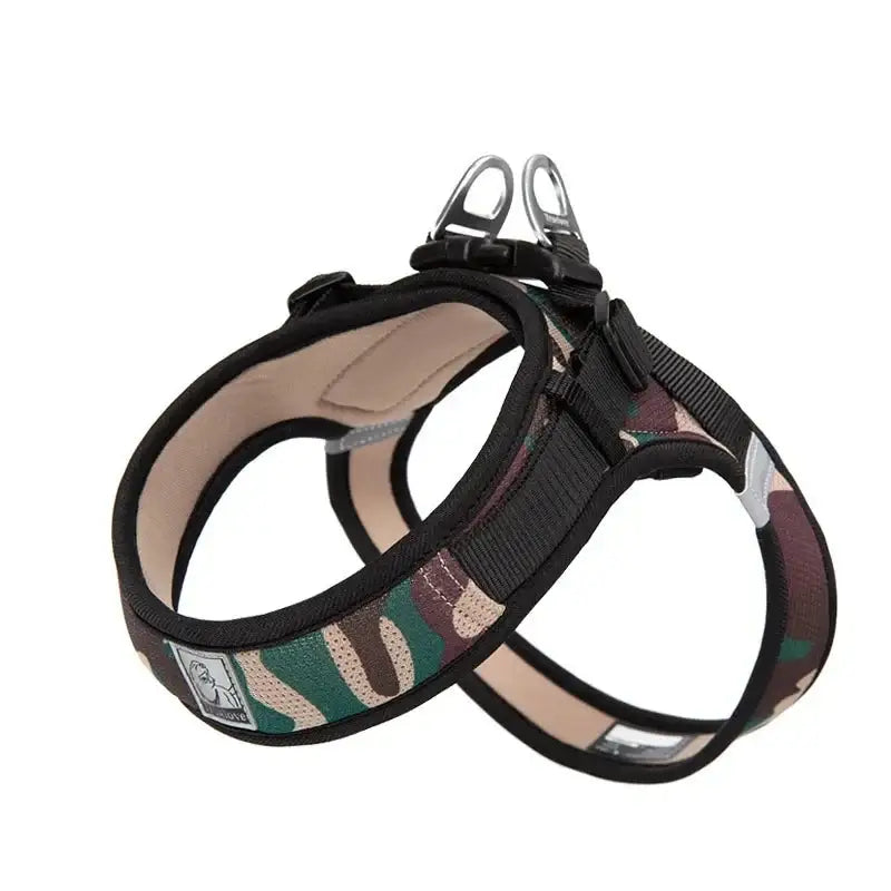 Dog harness with a camouflage pattern and padded interior.