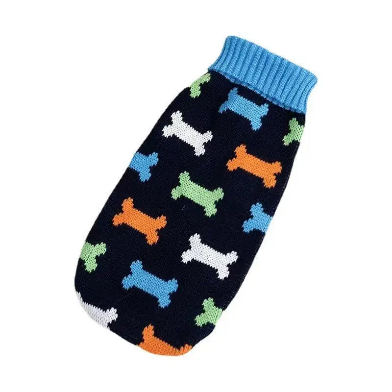 Dog sweater with colorful bone pattern on a navy background.