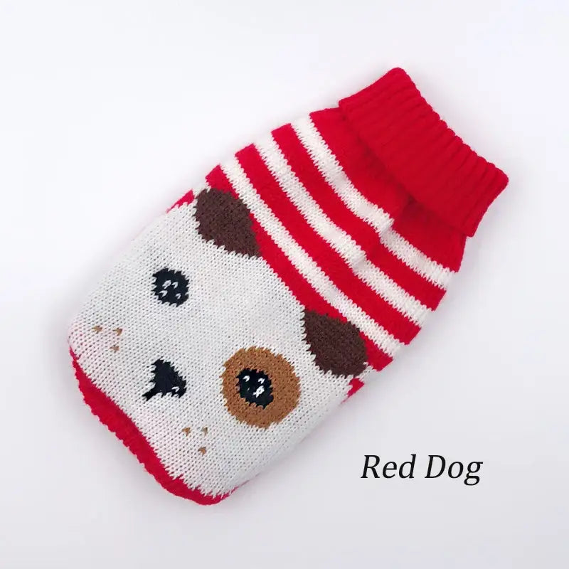 Knitted dog-themed sock or mitten with a red and white striped cuff.