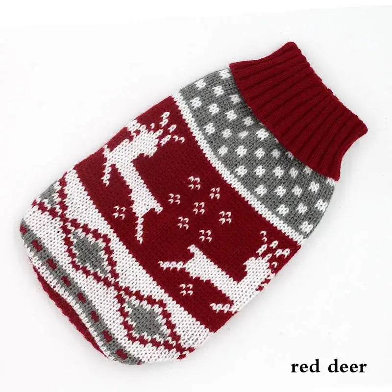 Knitted winter sweater for dogs featuring a red deer pattern.