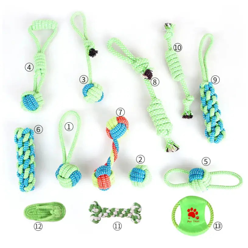 Collection of dog toys featuring various rope, rubber, and plush chew items in green and blue colors.