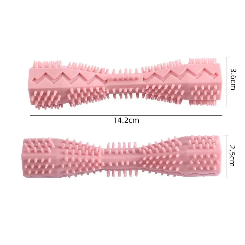 Pink silicone dog chew toy with textured surfaces and a bone-like shape.