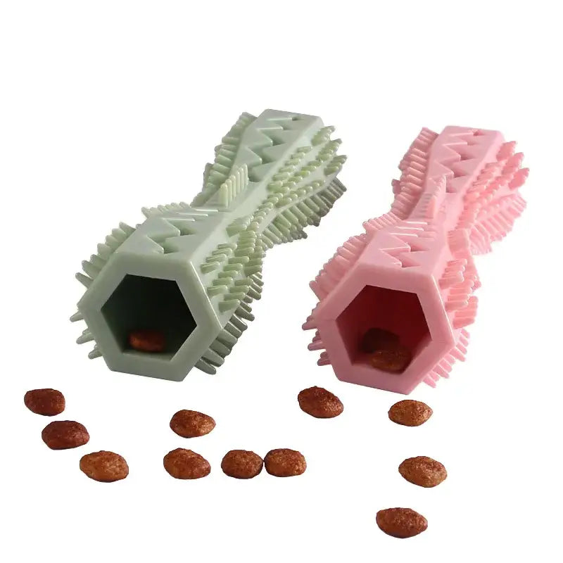 Rubber chew toys shaped like bones in pale green and pink colors with textured surfaces.