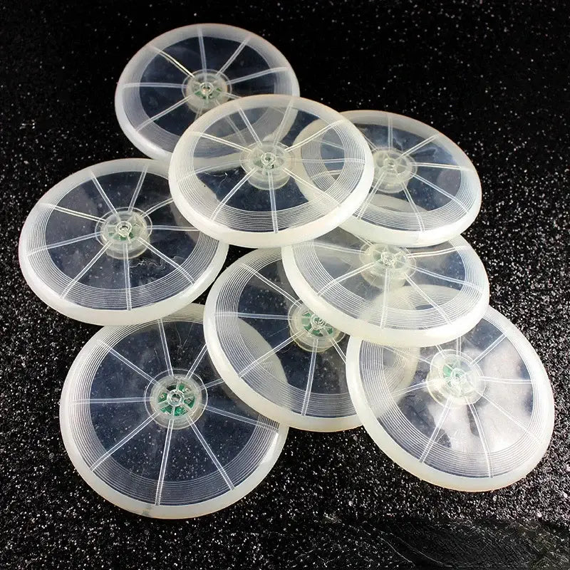 Circular plastic organizers with compartments arranged in a wheel-like pattern.