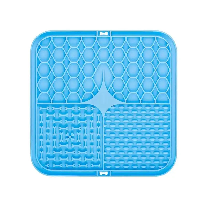 Blue plastic mat with different textured sections and a honeycomb pattern.