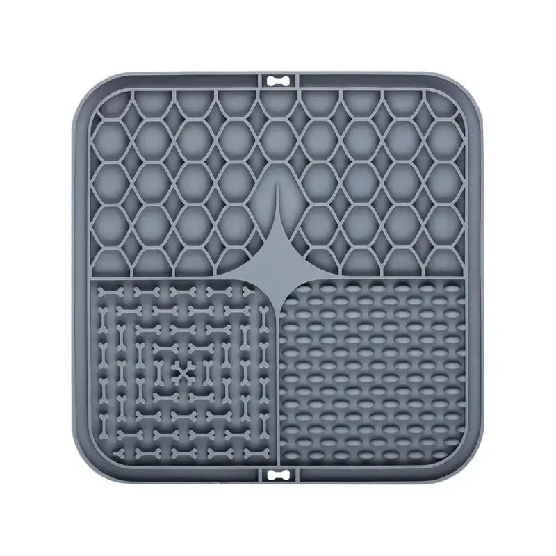 Gray plastic mat with various textured patterns divided into quadrants.