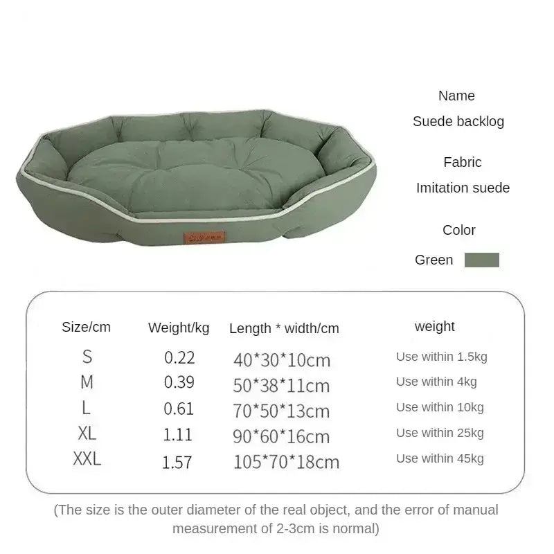 Oval-shaped green pet bed with padded sides and a cushioned interior.