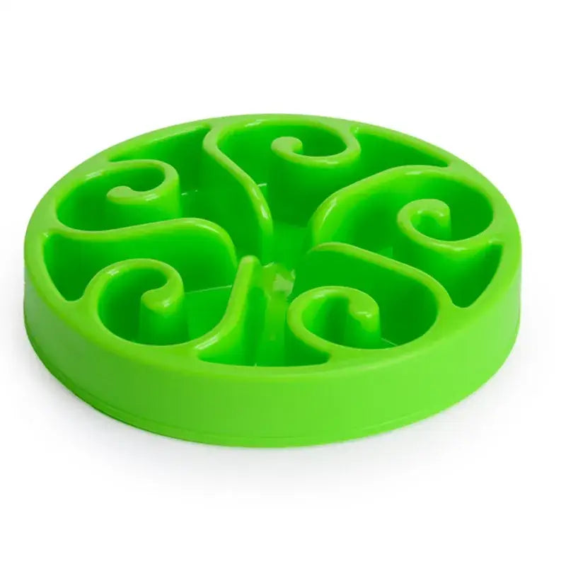 Bright green circular pet food bowl with swirling maze-like partitions.