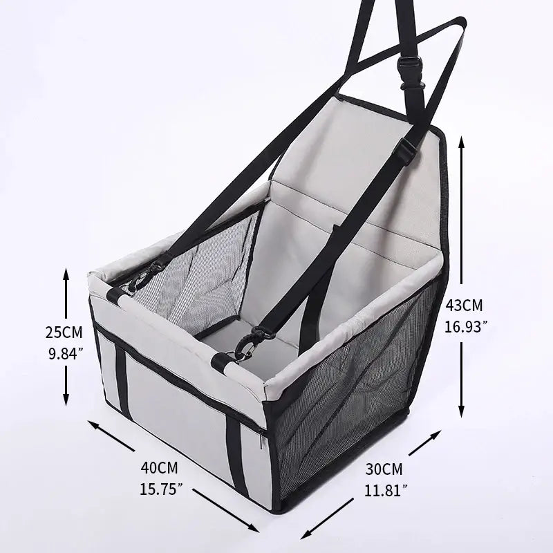 Pet car seat with safety harness and mesh sides.