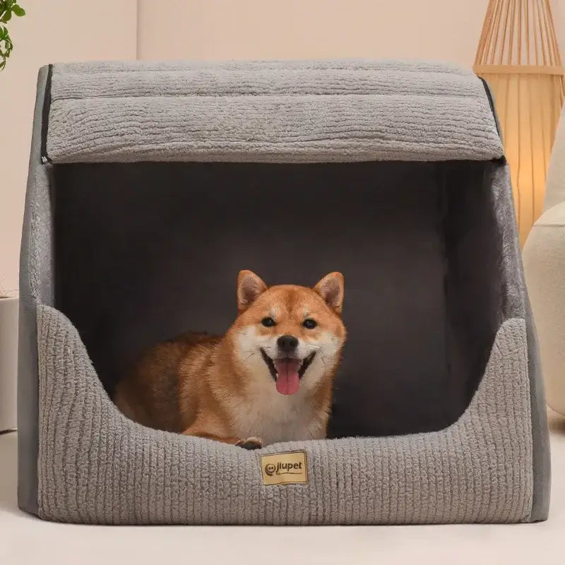 Gray fabric pet bed with a happy Shiba Inu dog inside.