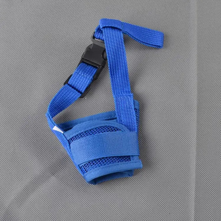 Blue dog muzzle with adjustable strap.