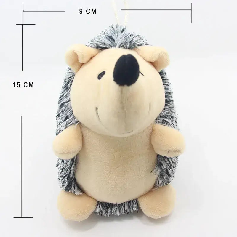 Plush toy hedgehog with a cream-colored body and gray spiky fur.