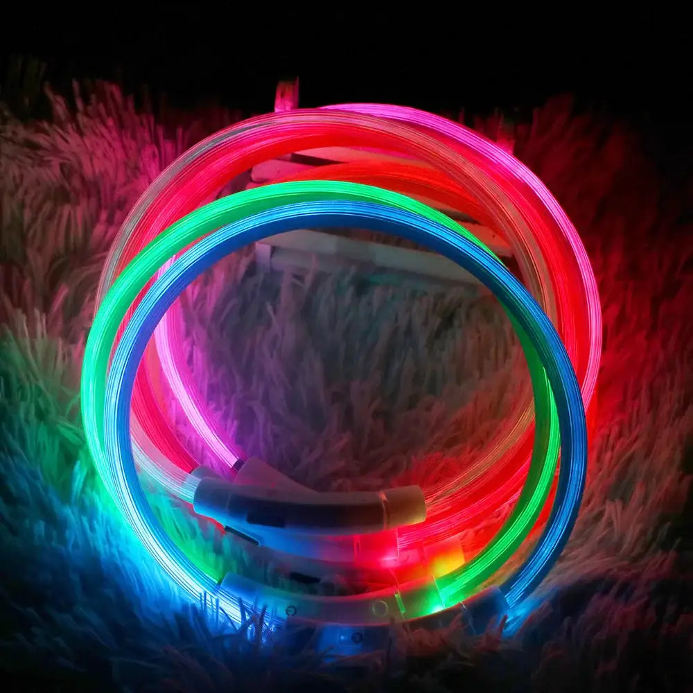 Circular arrangement of glowing, multicolored neon light tubes.