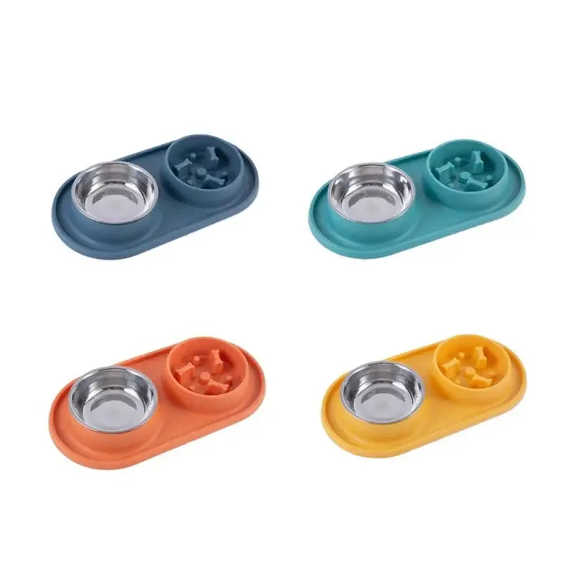 Pet food and water bowls in various colors with non-slip bases.