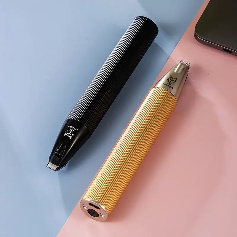 Two vape pens or e-cigarettes, one black and one gold-colored.