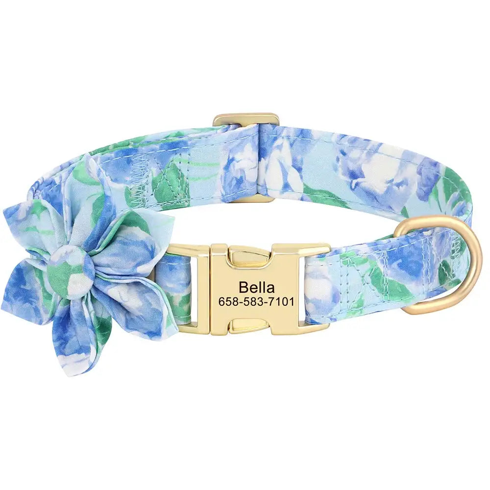 Floral-patterned dog collar with a gold buckle and flower decoration.