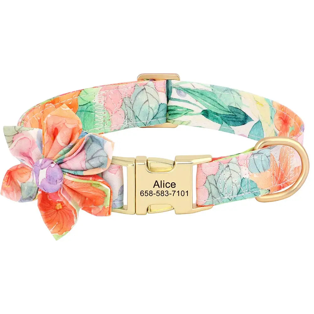 Floral patterned dog collar with a gold buckle and decorative flower attachment.