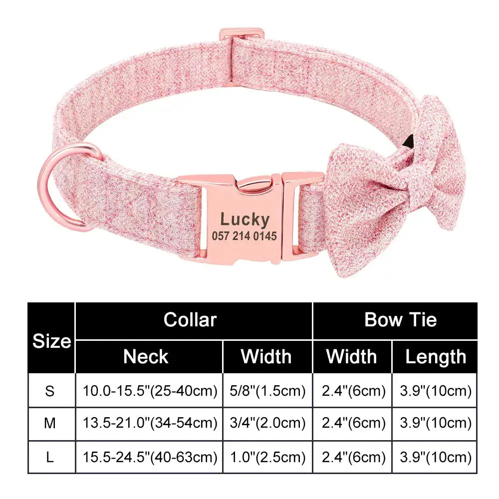 Pink fabric dog collar with a bow and personalized metal tag.