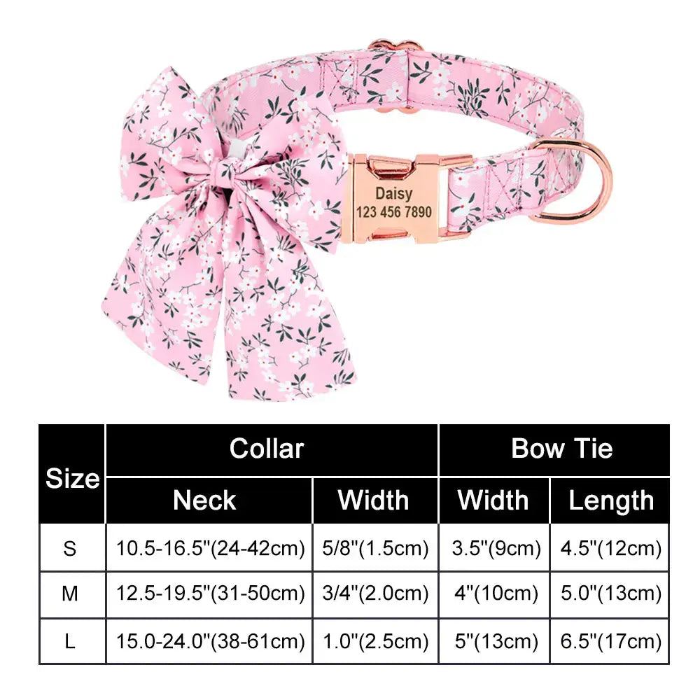 Pink floral dog collar with a bow and metal buckle.