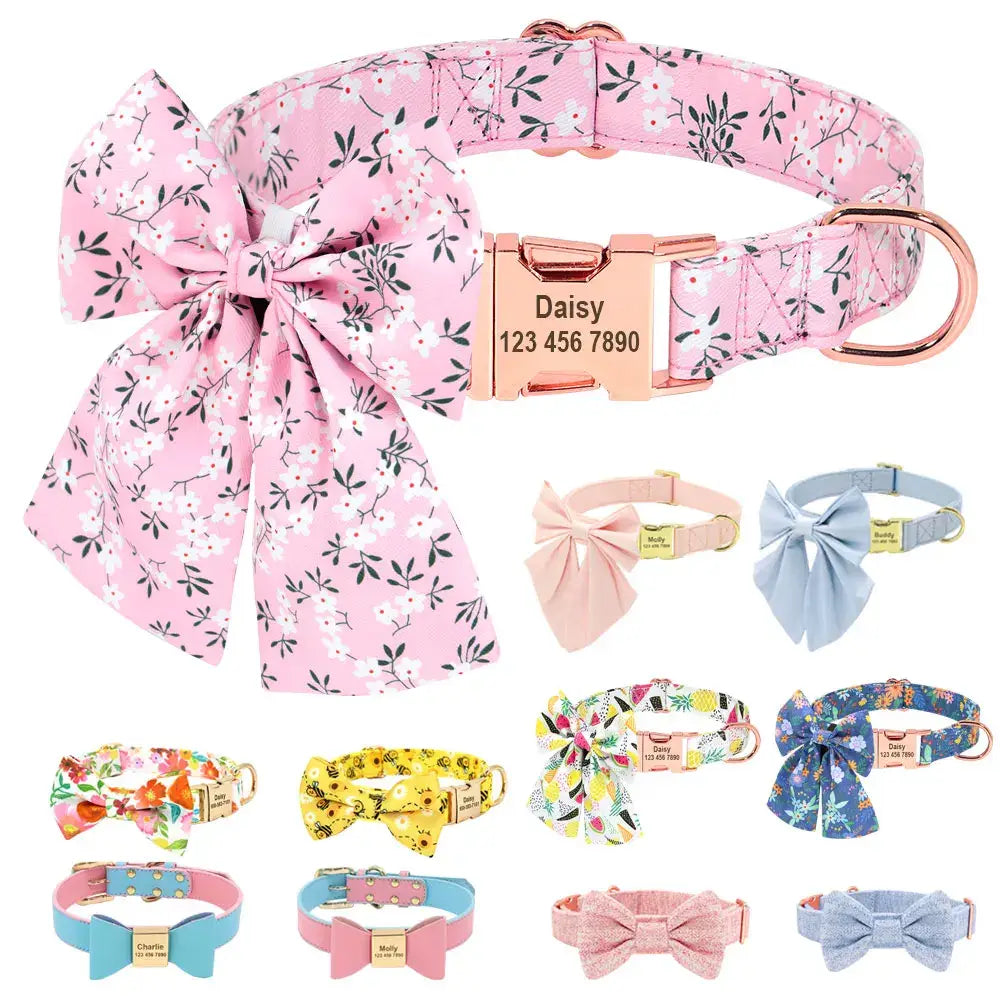 Pink floral dog collar with a large bow and personalized metal tag.