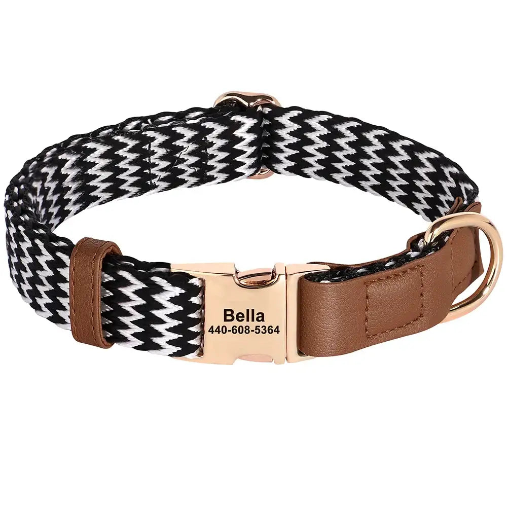 Stylish black and white patterned dog collar with brown leather accents and a gold-toned buckle.