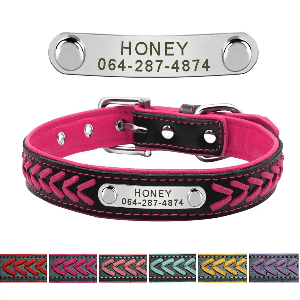 Personalized pink and black leather dog collar with an engraved metal nameplate.