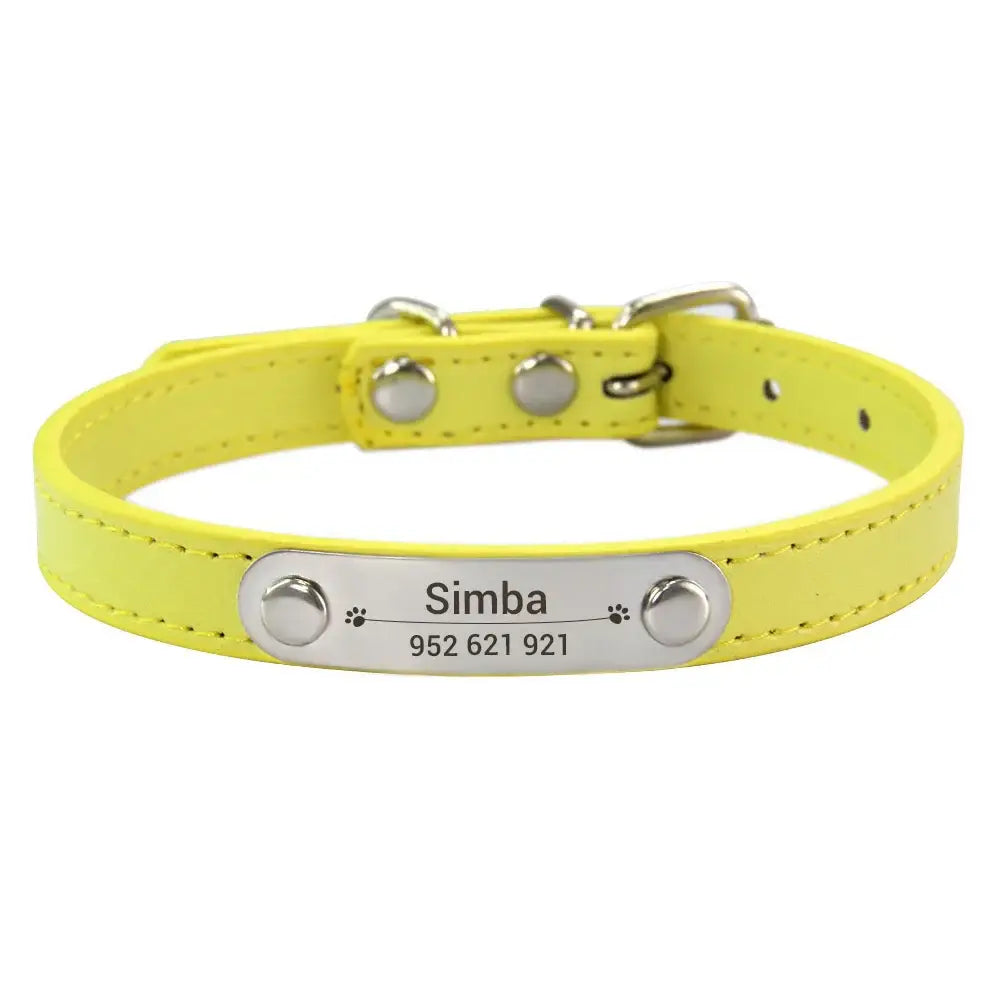 Bright yellow pet collar with a metal nameplate engraved ’Simba’ and a phone number.