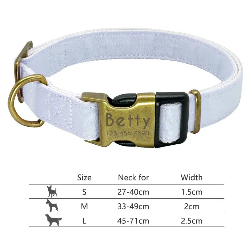 White dog collar with a gold-colored buckle engraved with ’Betty’ and size information displayed below.