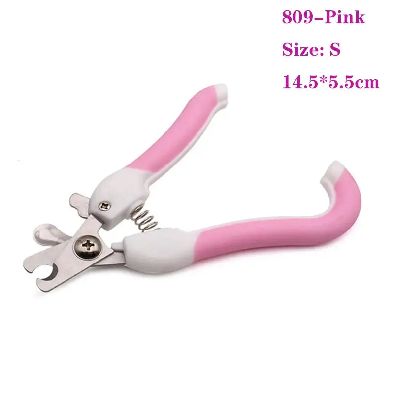 Pink and white pet nail clipper with a curved handle and metal cutting edge.