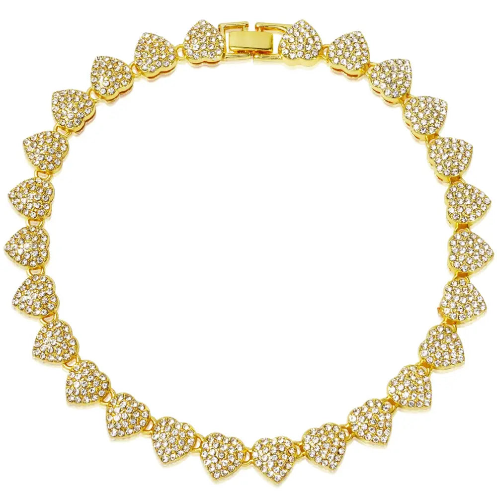 Gold-colored necklace with heart-shaped links covered in small crystals or diamonds.