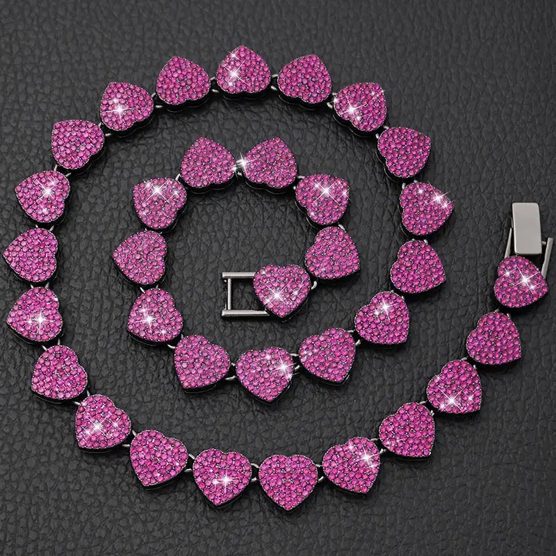 Necklace made of pink heart-shaped beads arranged in a spiral pattern.