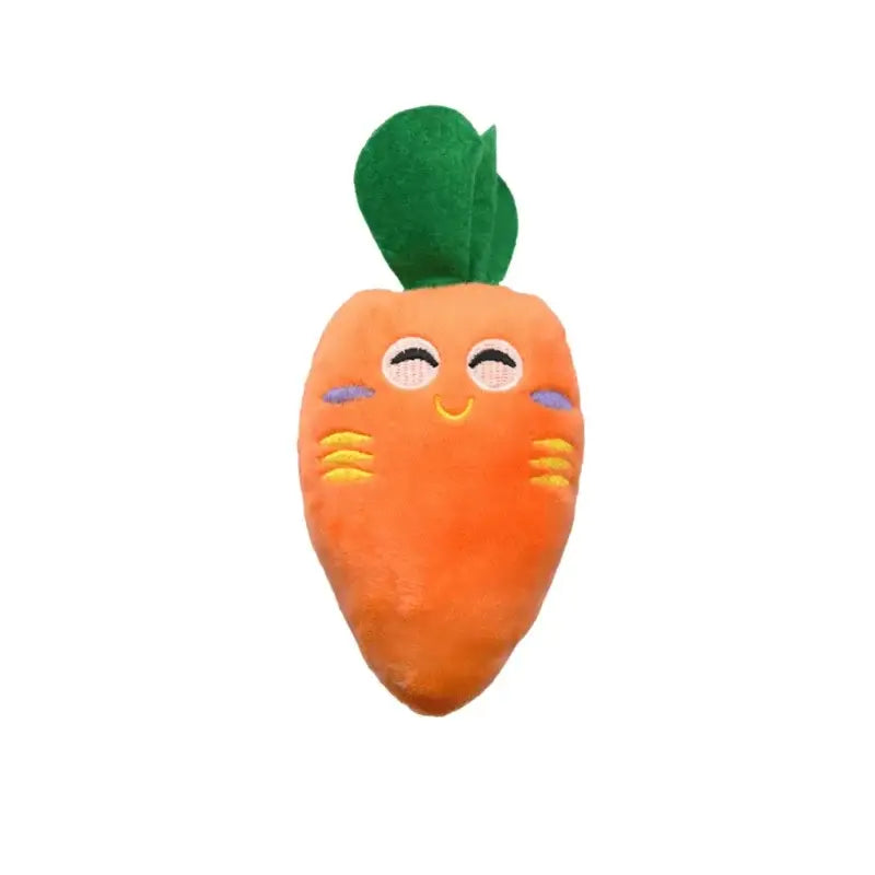 Smiling cartoon carrot plush toy with a cute face and green leafy top.