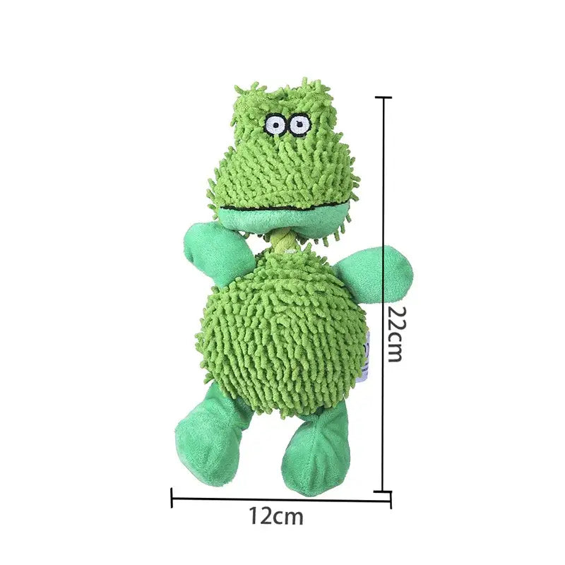 Fluffy green plush toy monster with googly eyes and soft limbs.