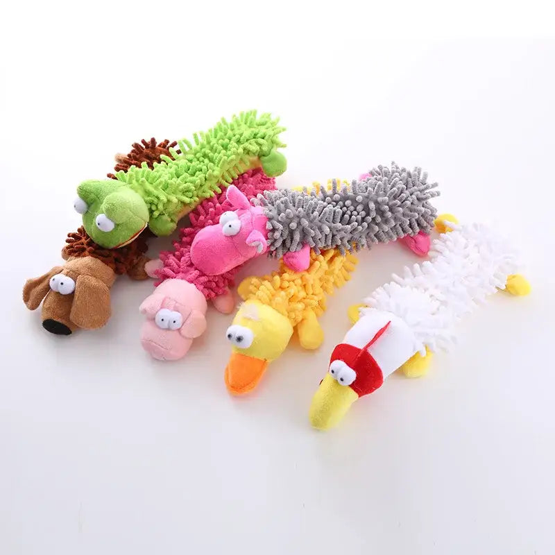 Colorful plush animal-shaped dog toys with various textures and designs.