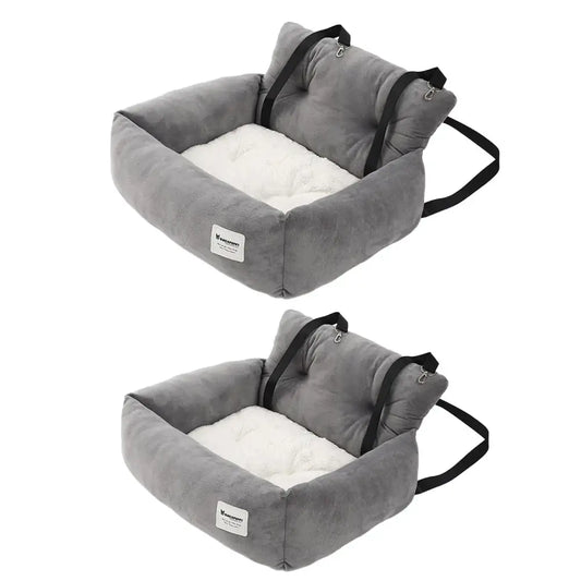 Pet car seat with soft cushioning and carrying handles.