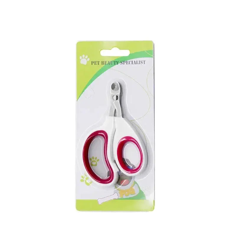 Pet nail clippers with pink handles packaged on a retail card.