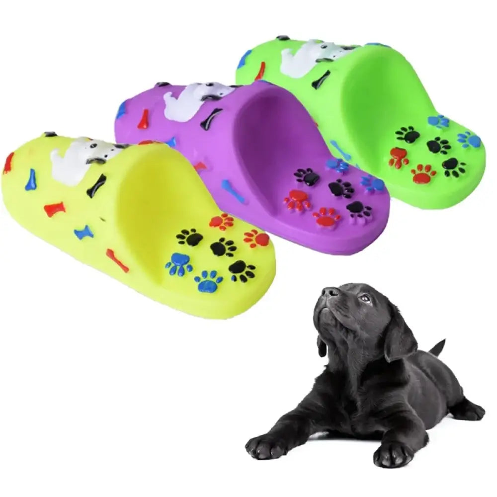 Colorful foam dog shoes decorated with paw prints and bone shapes.