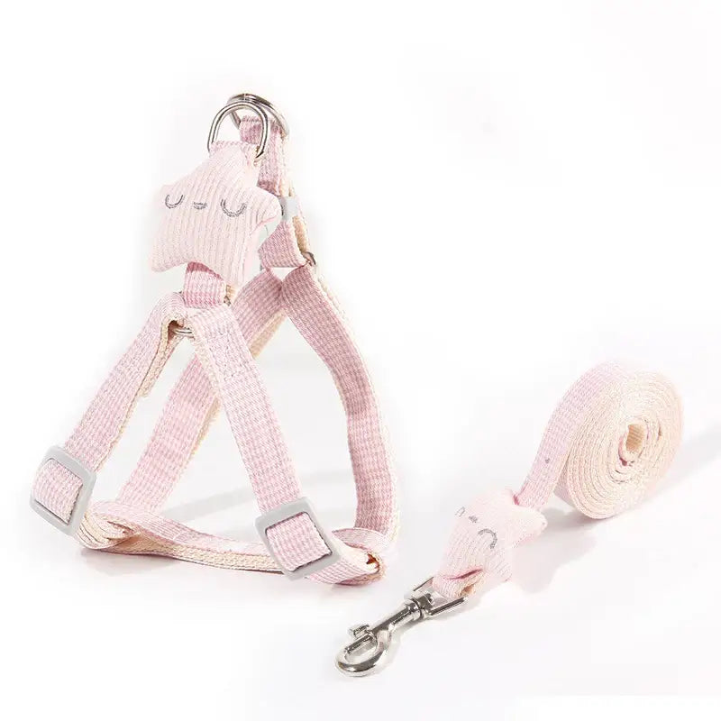 Pink dog harness and matching leash set.