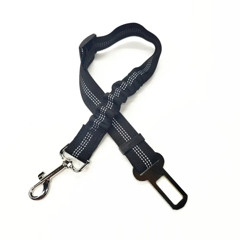 Dog seatbelt safety harness with reflective stitching and metal clip.